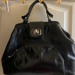 Black leather fossil doctors bag with key